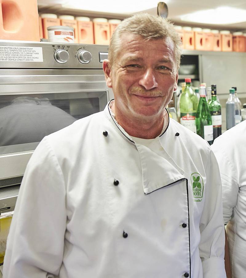 A photo of the host and chef Hanns Passing